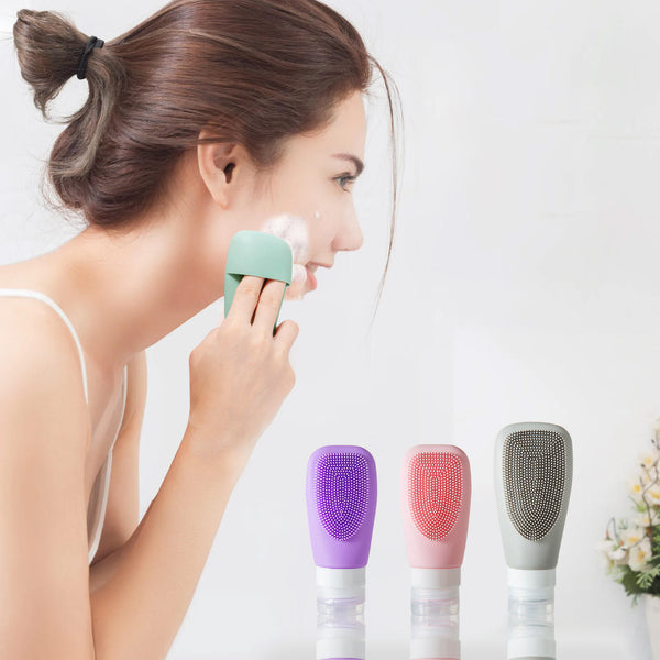 Woman using silicone refillable shampoo lotion bottles to apply skincare in pastel colors.