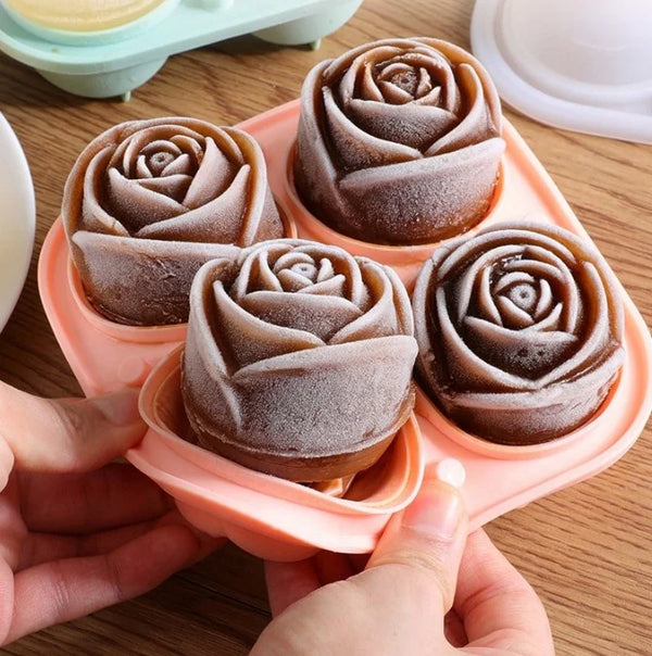 Silicone Rose Shaped Ice Cube Tray with four rose-shaped ice cubes being removed from the tray.