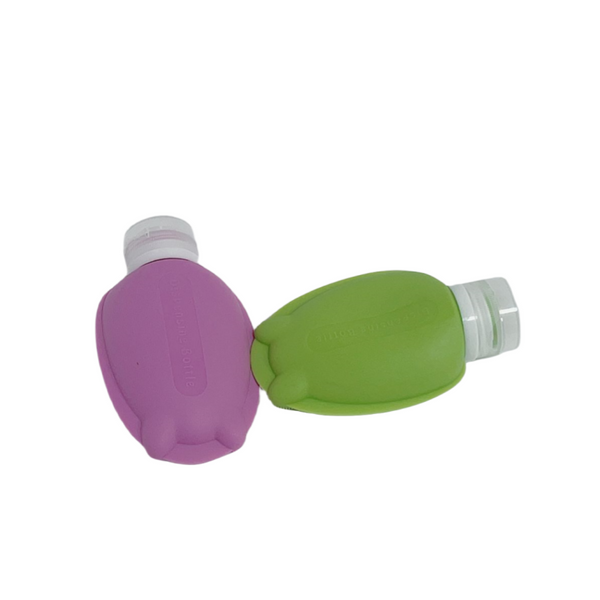 Silicone Travel Bottles Set 90ml 4 pack featuring purple and green soft silicone bottles for liquid storage.