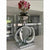 Luxury Silver Infinity Mirror Console Table with floral arrangement on top, showcasing modern glam design.