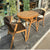 Space-Saving 3-Piece Outdoor Dining Set on a patio with two stylish chairs and a round table.