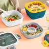 Stylish Two-Tier Airtight Lunch Box featuring colorful compartments filled with healthy meals on a table.