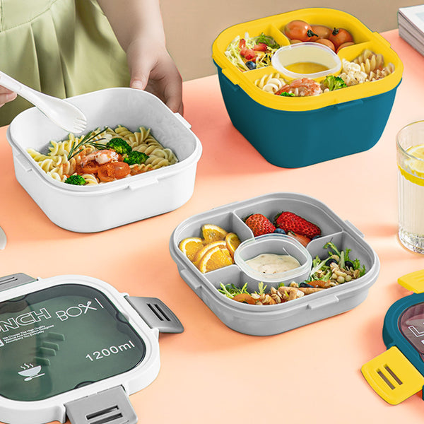 Stylish Two-Tier Airtight Lunch Box featuring colorful compartments filled with healthy meals on a table.