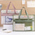 Transparent File Bag Document A4 Large in pink and green colors with visible contents for organization and protection.