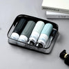 Travel Silicone Lotion Bottles in a transparent case, showcasing various colors and designed for easy travel.