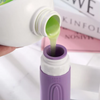 Pouring lotion into a Travel Silicone Lotion Bottles for easy travel storage.