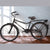 Unisex Pyramid Bicycle with Rear Carrier & Kickstand - Classic city bike for everyday journeys and errands.
