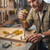 Person using the 4 Piece Amber Handle Precision Screwdriver Kit on a woodworking project.
