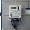 Single Phase Prepaid Electricity Sub Meter mounted on wall, displaying credit and read values for electricity usage.