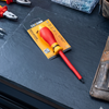 1000V VDE Insulated Screwdriver PZ3 x 150mm displayed on a black workbench with tools.