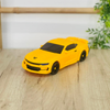 Sliding Transform Mini Robot Car Toy in vibrant yellow color on a wooden surface.