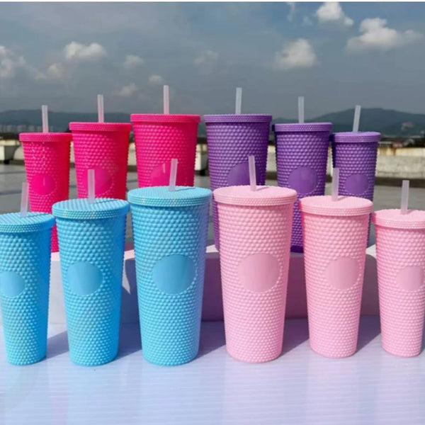 Solid Color Plastic Tumbler With Straw in pink, purple, and blue colors, ideal for cold beverages on the go.