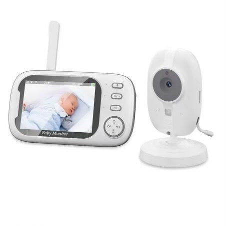 Wireless Video Baby Monitor with LCD Screen showing a baby on the monitor next to the camera unit.