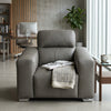 Grey Modern Accent Armchair in a stylish living room setting with a magazine and blanket on it.