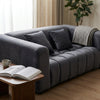 Modern Grey Upholstered 2-Seater Sofa with plush cushions and cozy throw, enhancing contemporary living space decor.