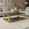 Gold Stainless Steel Coffee Table with sleek glass top in a modern living room setting.
