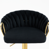 Adjustable Velvet Bar Stool with Woven Back and Gold Frame featuring a plush black velvet seat and gold accents.