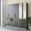 Bedroom Wardrobe Closet with mirror and multiple storage drawers in a modern bedroom setting.