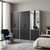 Stylish Bedroom Wardrobe Closet with mirror and drawers in modern bedroom setting.