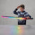 Child holding a Rechargeable LED Light-Up Toy Katana with colorful illumination effects.