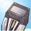 Solar Motion-Activated Wall Lamp with solar panel and LED lights against a blue sky.