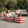 Red and White Striped Outdoor Bean Bag Lounger with matching ottoman in a stylish outdoor setting.