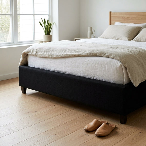 1.5M Heavy-Duty Bed Base featuring a cozy bed with a beige comforter in a modern bedroom setting. 1.8M Heavy-Duty Bed Base