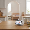 Wireless Video Baby Monitor with LCD Screen displaying a baby in a crib in a well-lit kitchen setting.