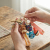 Silicone Animal Character Keychain featuring cute animal designs attached to a keyring with keys.