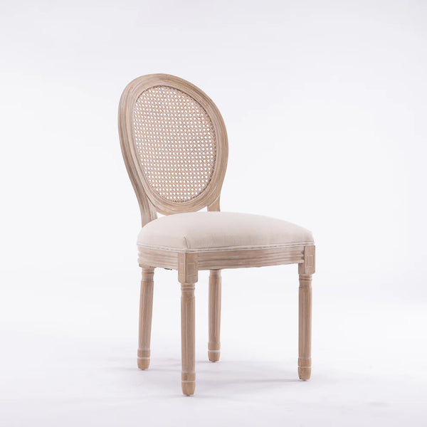 Vintage French Dining Chair with Rattan Back featuring a rattan backrest and wooden legs.