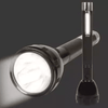 Pro High-Power Flashlight illuminating a dark space, showcasing its bright beam and sleek design.