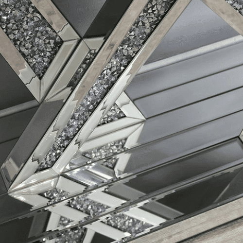 Elegant Silver Console & Mirror Set featuring geometric designs and reflective surfaces.