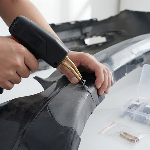 Using the Hot Stapler Plastic Repair Kit with 1200PCS Staples to repair a damaged plastic component.