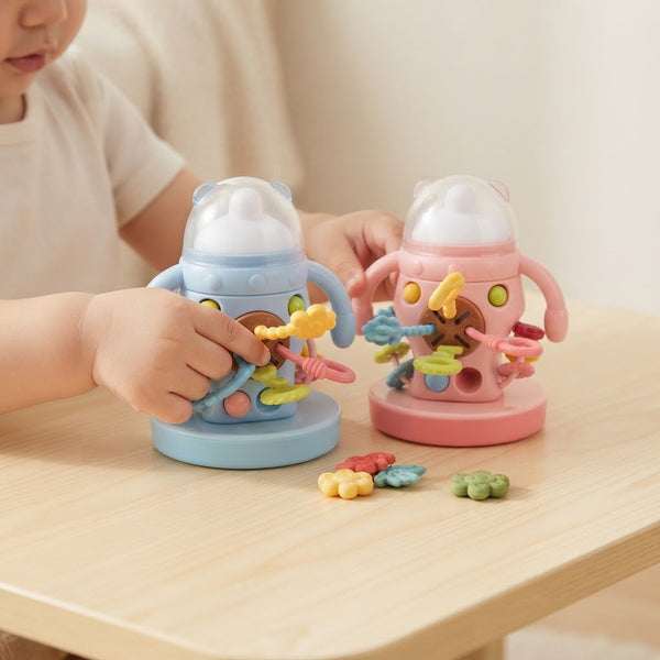 Baby Stacking Cup Puzzle Set with colorful pieces and a toddler engaged in play.