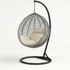 Hanging Egg Chair with Stand and Cushions in gray with soft beige cushions, perfect for outdoor relaxation.