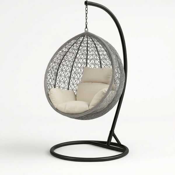 Hanging Egg Chair with Stand and Cushions in gray with soft beige cushions, perfect for outdoor relaxation.