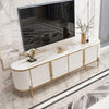 Fancy TV Stand featuring a faux marble top and gold accents, enhancing an elegant living room decor.