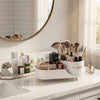 360-Degree Rotating Makeup & Skincare Organizer with makeup brushes and skincare products on a vanity.