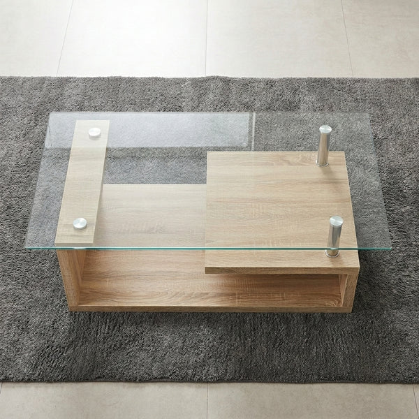 Tempered Glass Top Coffee Table with Oak Base on a gray rug, showcasing its modern design and sturdy structure.