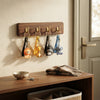 4 colorful 3D Animal Silicone Keychains hanging on hooks, showcasing playful animal designs.
