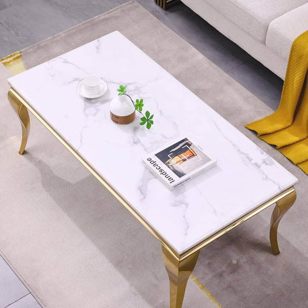 Sleek Modern Coffee Table with a marble top and gold legs, showcasing minimalist design in a stylish living room setting.