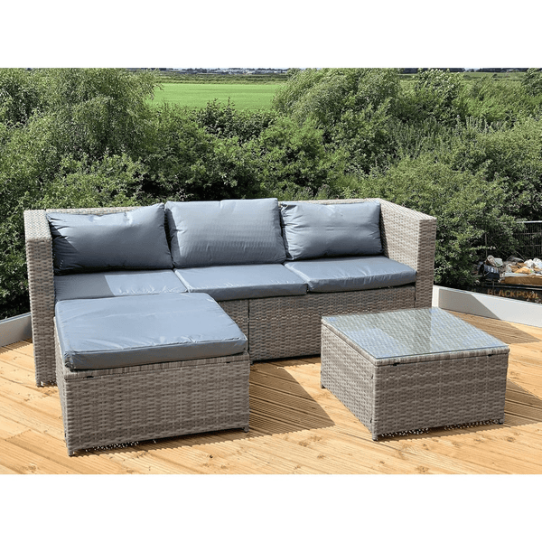 Garden Lounge Set with Grey Cushions displayed in an outdoor setting, featuring a spacious sofa and coffee table.