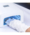 36W Mini UV Gel Curing Lamp curing nails with gloved hand inside the device.