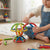 Child building a custom 3D structure with Flexible Magnetic Building Rods Set in a bright playroom.