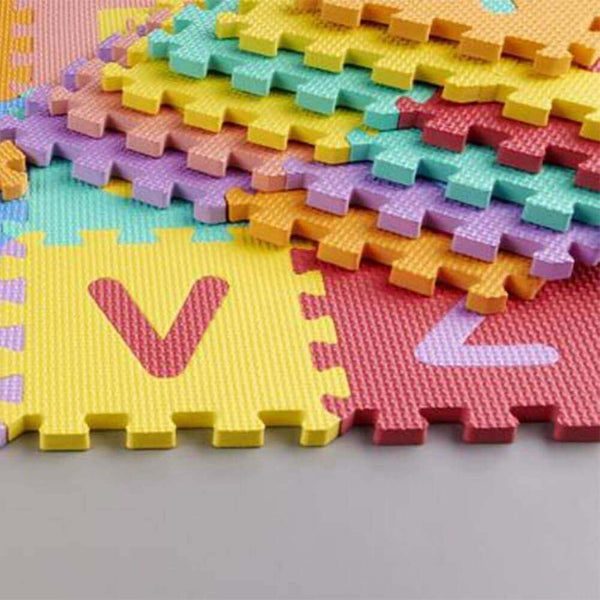 Colorful interlocking foam tiles of the Alphabet Play Mat featuring letters and bright colors for educational play.