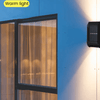 Weatherproof Outdoor Wall Light providing warm illumination on an exterior wall, enhancing outdoor spaces.