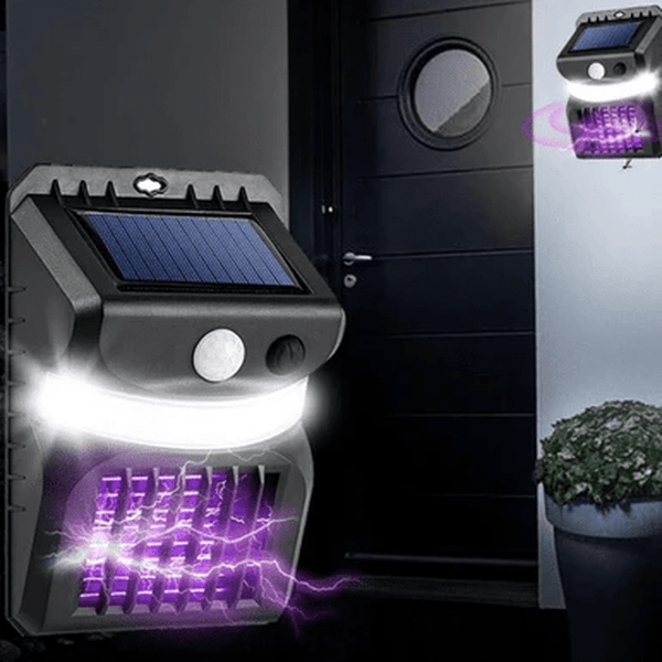 UV Mosquito Killer & Outdoor Lamp mounted near a door showcasing its solar panel and purple light for insect attraction.