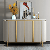 Modern Luxury Sideboard Table featuring fluted doors, gold accents, and a marble-effect top with decorative accents.