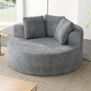 Round Corduroy Lounge Chair for Cozy Spaces in a modern living room setting with decorative pillows.