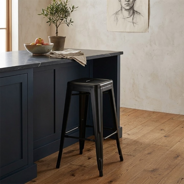 Counter Bar Chair positioned at a kitchen island with a modern design and durable metal frame.